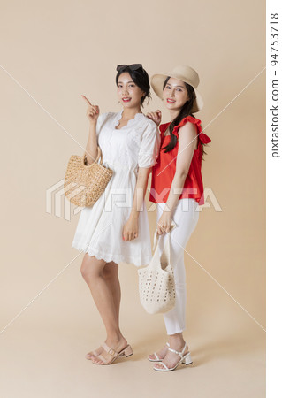 summer vacation trip with friends concept series_korean beautiful asian young women with hand motions 94753718