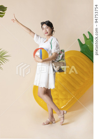 summer vacation trip with friends concept series_korean beautiful asian young woman holding a pool float ball summer vacation trip with friends concept series_korean beautiful asian young woman holding a pool float ball 94753754