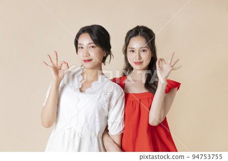 summer vacation trip with friends concept series_korean beautiful asian young women with hand motions summer vacation trip with friends concept series_korean beautiful asian young women with hand motions 94753755