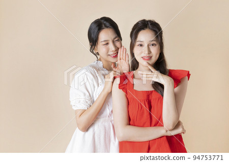 summer vacation trip with friends concept series_korean beautiful asian young women whispering summer vacation trip with friends concept series_korean beautiful asian young women whispering 94753771