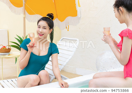 summer vacation trip with friends concept series_korean beautiful asian young women holding Champagne glasses summer vacation trip with friends concept series_korean beautiful asian young women holding Champagne glasses 94753866