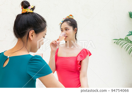 summer vacation trip with friends concept series_korean beautiful asian young women drinking champagne 94754066