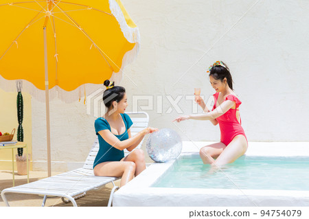 summer vacation trip with friends concept series_korean beautiful asian young women drinking champagne summer vacation trip with friends concept series_korean beautiful asian young women drinking champagne 94754079