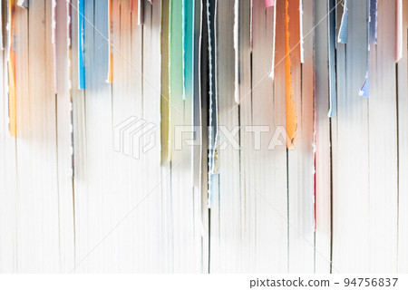 Edges of closed book with bookmaks close-up Edges of closed book with bookmaks close-up 94756837
