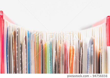 Edges of closed book with bookmaks close-up Edges of closed book with bookmaks close-up 94756838