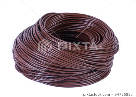 Roll of brown electrical single core cable isolated white background 94756853