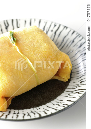 Take a picture of chakin sushi, a special treat for the day, on a white background 94757576