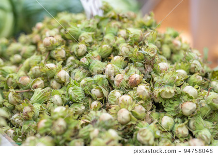 Hazelnut on the street market closeup 94758048