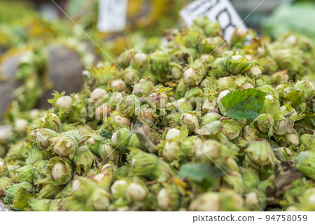Hazelnut on the street market closeup 94758059