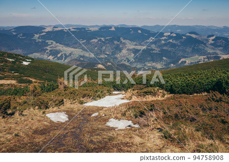 A view of a large mountain in the background 94758908
