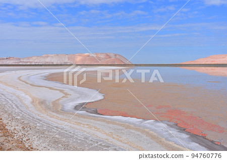 Toxic lake between the potash waste hills 94760776