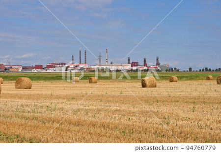 Haystacks with a view of the plant Haystacks with a view of the plant 94760779