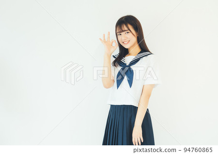 High school student doing an okay sign High school student doing an okay sign 94760865
