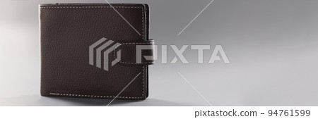 Brown genuine leather wallet with banknotes and credit card inside Brown genuine leather wallet with banknotes and credit card inside 94761599