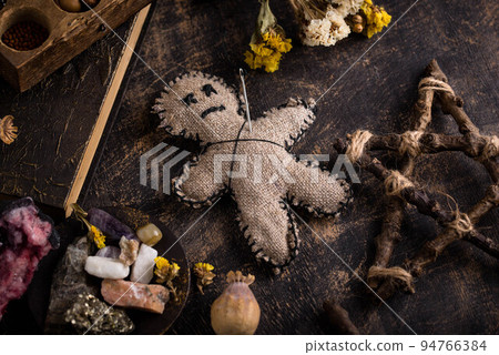 Voodoo doll. Black magic esoteric ritual. 94766384