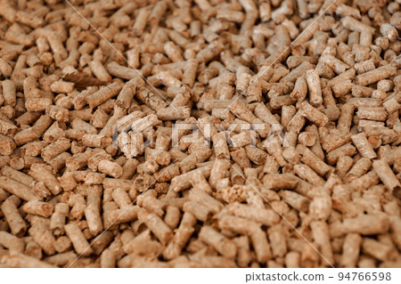 close up to Wood Pellet pile for alternative energy power, raw material background. 94766598
