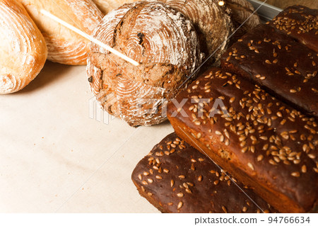Showcase with Different Kinds of Fresh Hand Made Bread. Bakery. Showcase with Different Kinds of Fresh Hand Made Bread. Bakery. 94766634