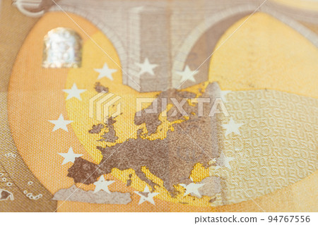 Europe map on a fifty euro banknote bill. Concept of uniting European countries Europe map on a fifty euro banknote bill. Concept of uniting European countries 94767556