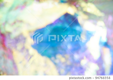 Unfocused holographic colors of mother-of-pearl foil. Crumpled iridescent foil with a real texture. Holographic iridescent abstract background. High quality photo Unfocused holographic colors of mother-of-pearl foil. Crumpled iridescent foil with a real texture. Holographic iridescent abstract background. High quality photo 94768358