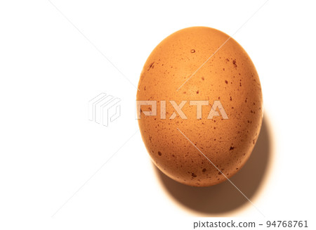 Organic brown chicken egg on white background Organic brown chicken egg on white background 94768761