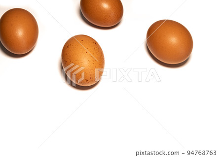Four brown egg isolated on white background Four brown egg isolated on white background 94768763