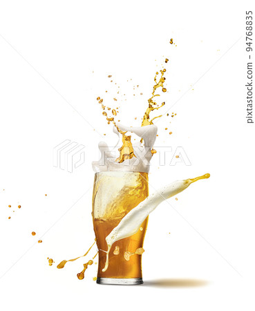 Drops and splashes. Full glass of frothy light lager beer isolated over light background. Concept of alcohol, oktoberfest, drinks, holidays and festivals. Drops and splashes. Full glass of frothy light lager beer isolated over light background. Concept of alcohol, oktoberfest, drinks, holidays and festivals. 94768835