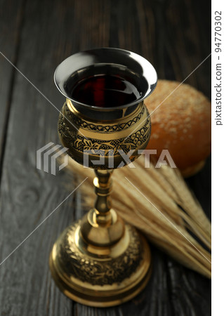 Concept or composition of Eucharist, close up Concept or composition of Eucharist, close up 94770302
