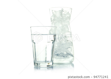 Jug with ice and glass of water isolated on white background Jug with ice and glass of water isolated on white background 94771241