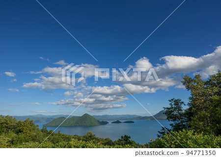 View of blue sky, Lake Toya and Nakajima from Silo Observatory 94771350