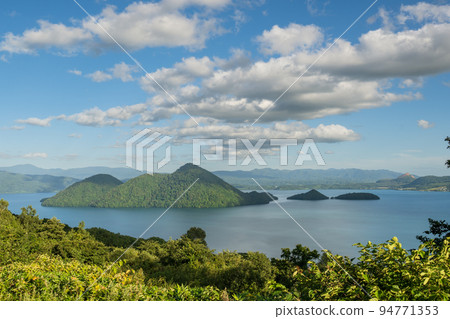 View of blue sky, Lake Toya and Nakajima from Silo Observatory 94771353
