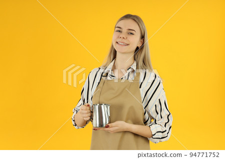 Concept of occupation, young waiter on yellow background 94771752