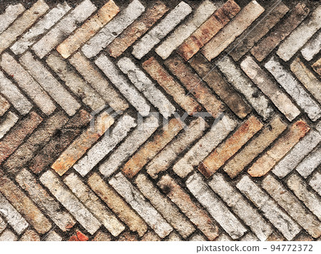 pavement of stone pavers as a background 94772372