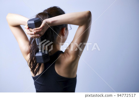 Training young women muscle training dumbbells Training young women muscle training dumbbells 94772517