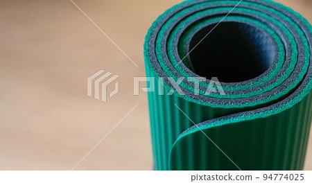 Roll yoga mat or mattress banner background Roll yoga mat or mattress banner background 94774025