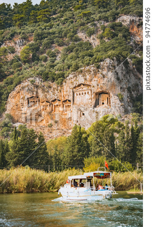Famous Lycian Tombs of ancient Caunos city, Dalyan, Turkey Famous Lycian Tombs of ancient Caunos city, Dalyan, Turkey 94774696