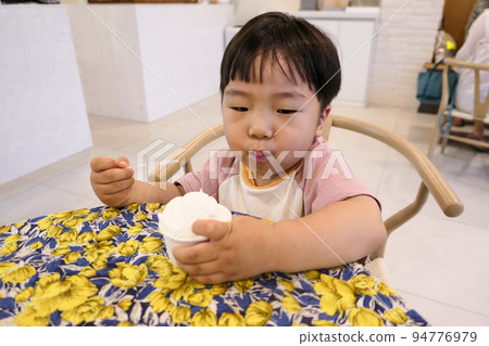 baby eating ice cream baby eating ice cream 94776979