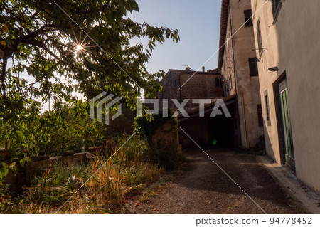 A quiet street of residential buildings in the historic medieval village of Panzano Tuscany A quiet street of residential buildings in the historic medieval village of Panzano Tuscany 94778452
