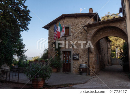 A quiet street of residential buildings in the historic medieval village of Panzano Tuscany A quiet street of residential buildings in the historic medieval village of Panzano Tuscany 94778457