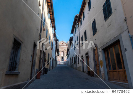 A quiet street of residential buildings in the historic medieval village of Panzano Tuscany A quiet street of residential buildings in the historic medieval village of Panzano Tuscany 94778462