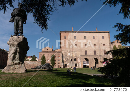A glimpse of the Palazzo della Pilotta, Parma, Italy, framed in an arch 94778470