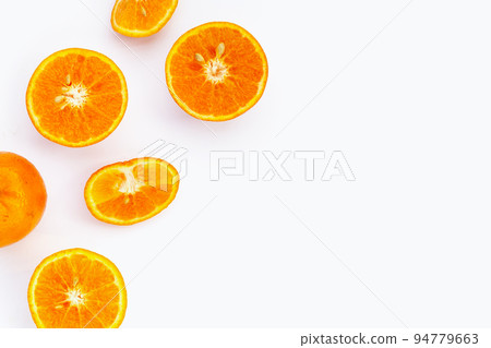 Fresh orange citrus fruit isolated on white background. Juicy, sweet and high vitamin C Fresh orange citrus fruit isolated on white background. Juicy, sweet and high vitamin C 94779663