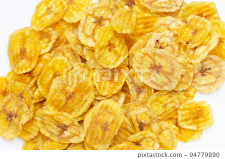 Banana slice chips on white background. Banana slice chips on white background. 94779890