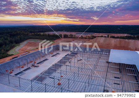 Industrial building roof truss frame installation the construction in steel warehouse Industrial building roof truss frame installation the construction in steel warehouse 94779902