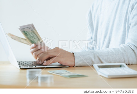 man with foreign currency man with foreign currency 94780198