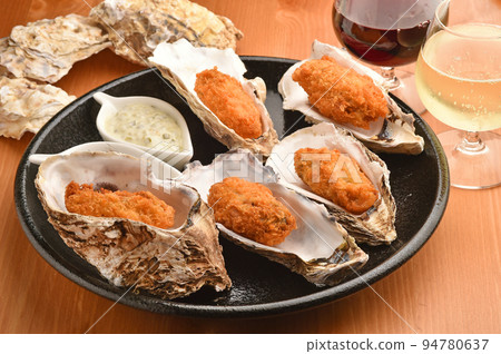 Delicious Oyster Snacks Fried Oysters and Wine 94780637