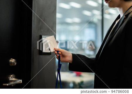 Career woman entering the security zone Faceless Career woman entering the security zone Faceless 94786008