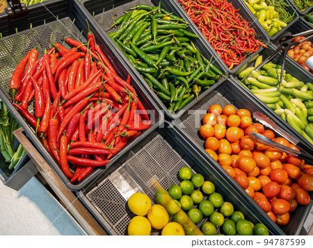 Fresh organic Vegetables and fruits on shelf in supermarket, farmers market. Healthy food market concept. Fresh organic Vegetables and fruits on shelf in supermarket, farmers market. Healthy food market concept. 94787599