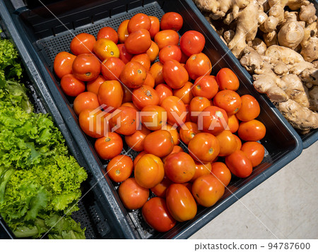 Fresh organic Vegetables and fruits on shelf in supermarket, farmers market. Healthy food market concept Fresh organic Vegetables and fruits on shelf in supermarket, farmers market. Healthy food market concept 94787600