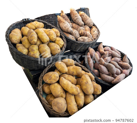 Potato displayed on the shelf with price tag in supermarket. Potato displayed on the shelf with price tag in supermarket. 94787602