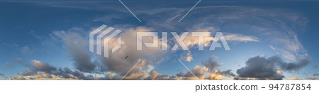 Dark blue sunset sky panorama with Cumulus clouds. Seamless hdr pano in spherical equirectangular format. Complete zenith for 3D visualization, game and sky replacement for aerial drone 360 panoramas. 94787854